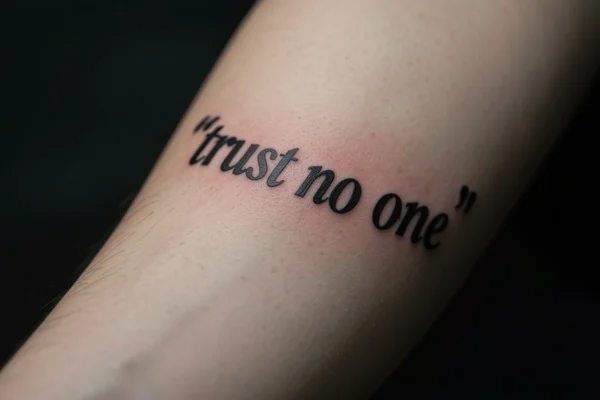 17 Soulful Bold Trust No One Tattoos to Honor Your Journey